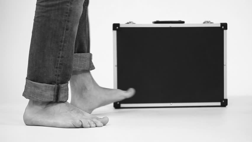 Suitcase barefooted men theft scene