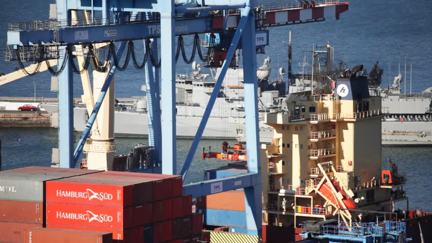 VALPARAISO, CHILE - JANUARY 29: Timelapse of a Gantry Crane loading a cargo ship in the port of Valparaiso on January 29, 2013 in Valparaiso, Chile. 