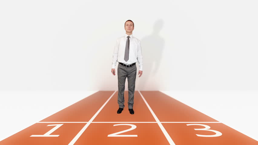 Businessman getting ready for sprint race