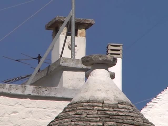 Alberobello is famous for his trulli. A trullo is a traditional Apulian stone dwelling with a conical roof.