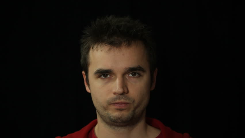 Negative refusing man shaking his head, studio isolated.