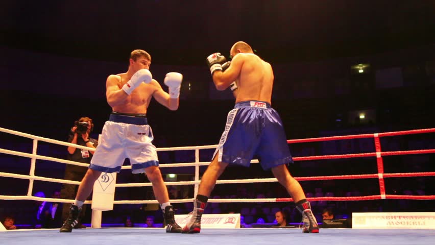 MOSCOW - JAN 13: D.Shved Dinamo Moscow vs I.Militopulos Bangkok Elephants in WSB boxing match at Krylatskoye Sports Palace - Basket-Hall, Jan 13, 2012, Moscow, Russia.