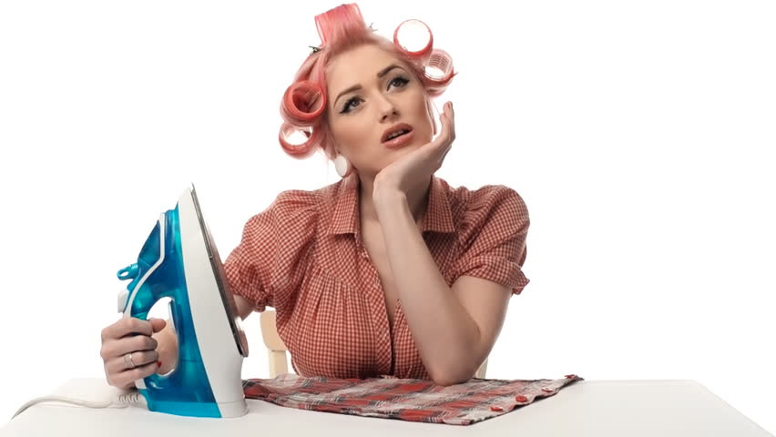 beautiful portrait of pin-up girls housewife with iron