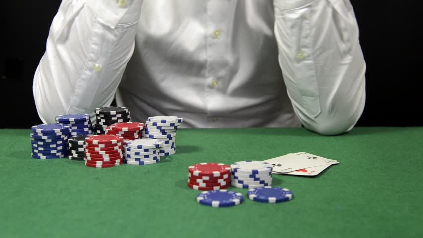 Poker player with a bad hand loses his bet