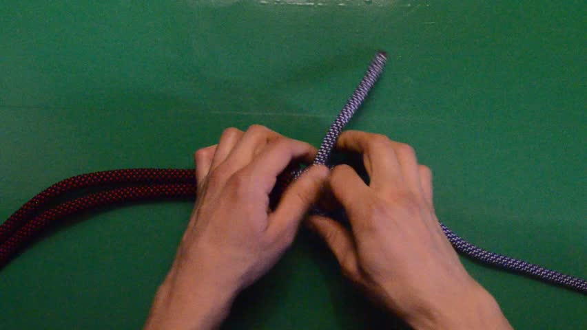 Square Knot (Reef Knot), tourism and marine knots, on a green background