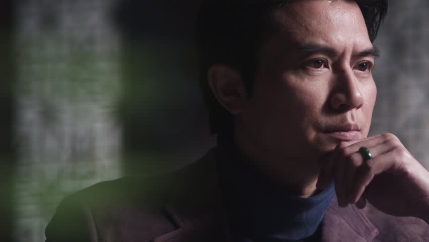 meditating man opening eyes dolly sho