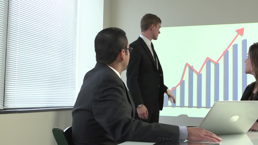 Business man presenting the company's profits using a graph