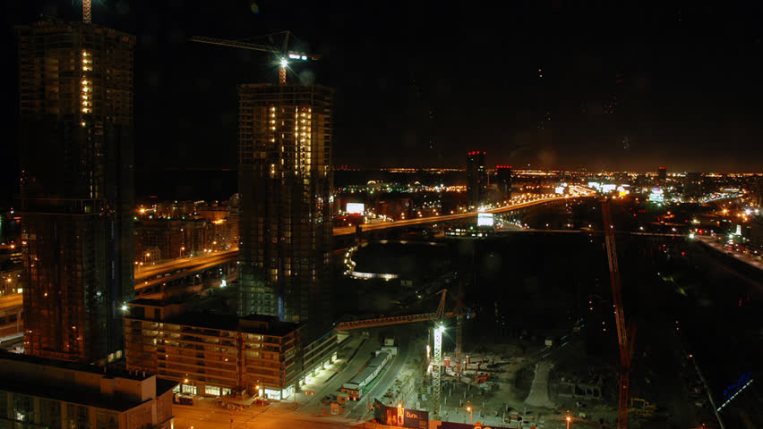 Time lapse. Southwest view 24 hours of construction and city traffic (HD).