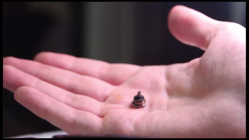 Alternative medicine, SuJok Therapy: moxa is dropped out from a hand to the ashtray