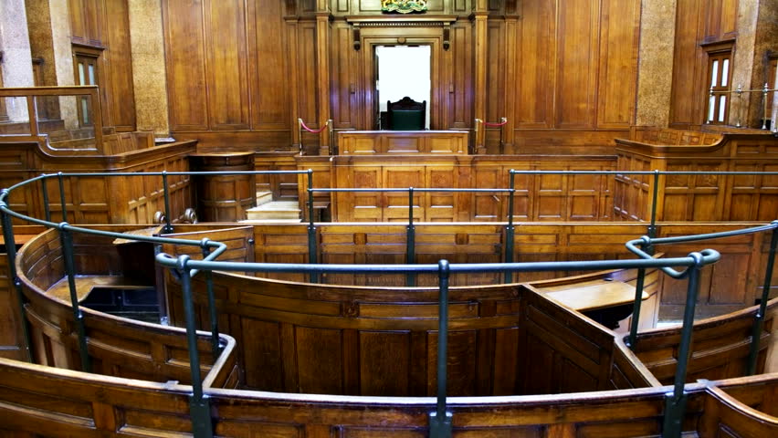 Very slow zoom in of a crown court room with judges chair