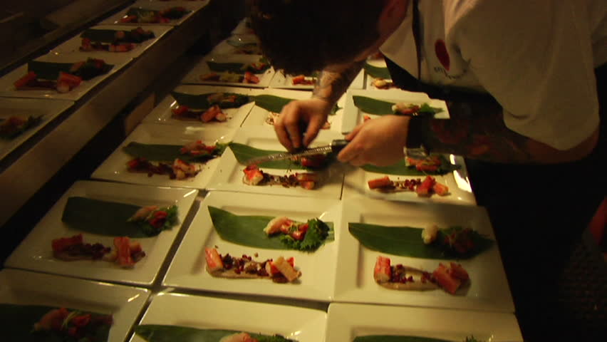 sushi chef makes large quantities