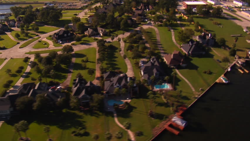 aerial shot of lavish lakefront houses