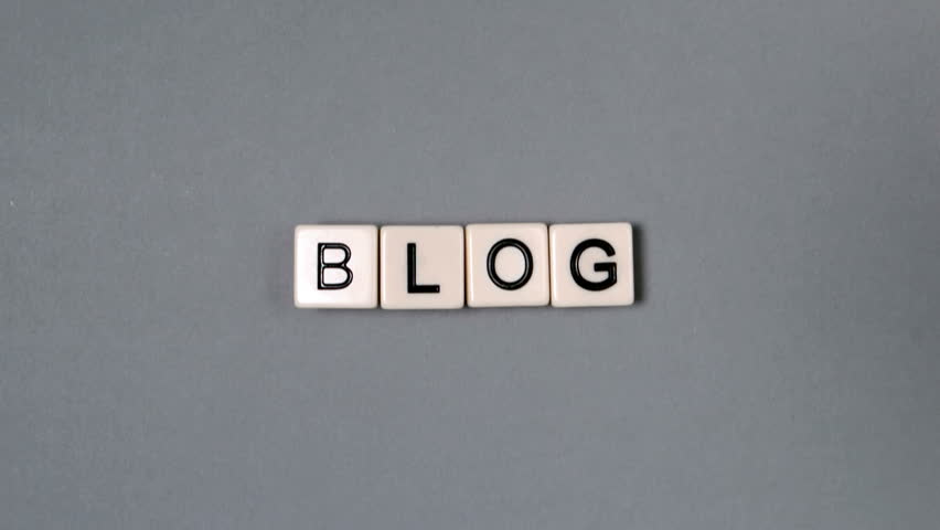 Plastic letters bouncing and spelling out blog in slow motion