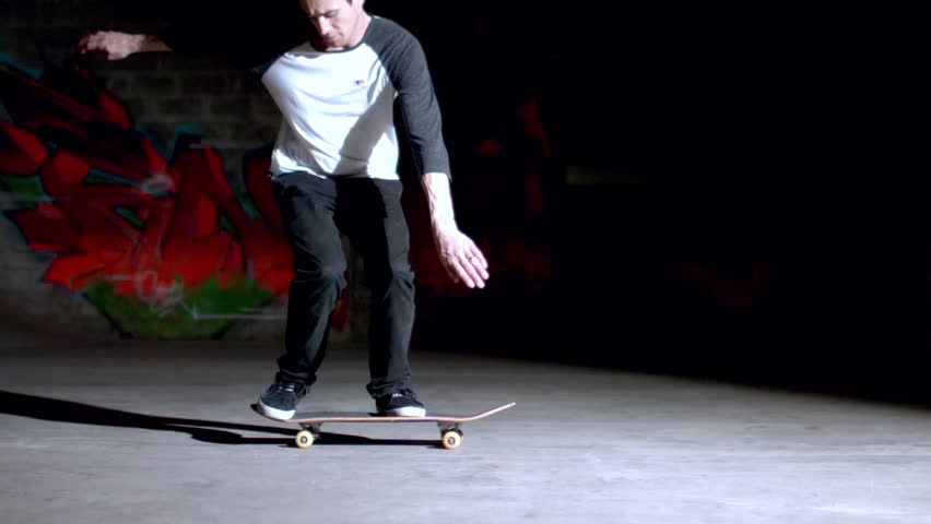 Skater doing backside 360 trick in slow motion