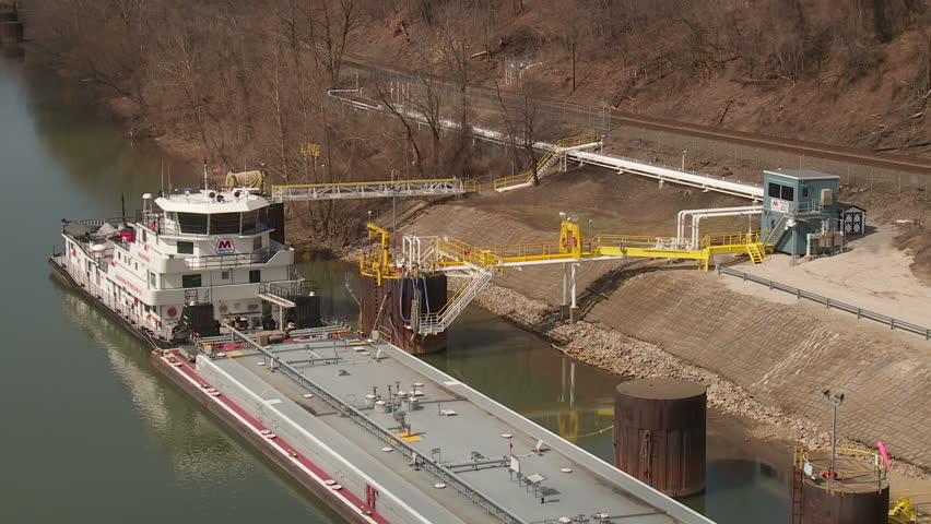 INDUSTRY, PA - MARCH 31: Marathon Petroleum towboat (pushboat) "Marathon" sits docked on the Ohio River on March 31, 2013 at the Industry/Midland, Pennsylvania facility.