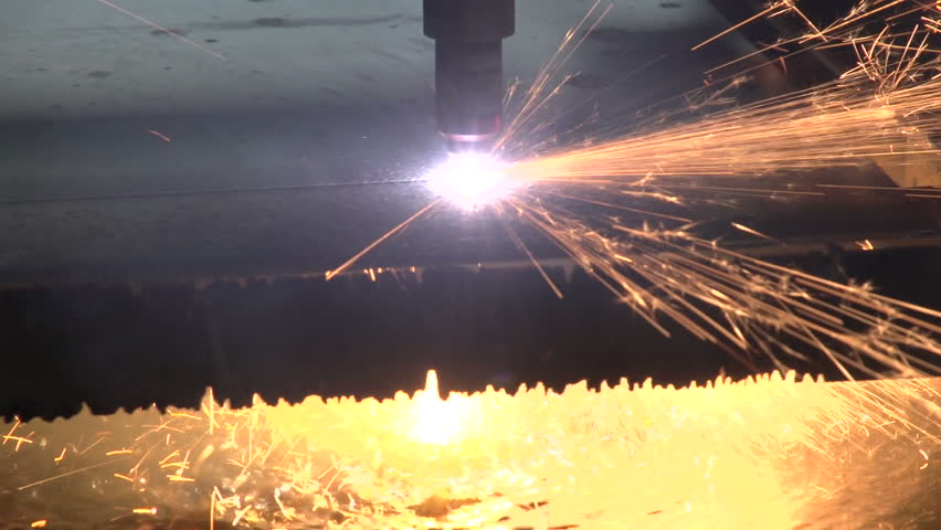 Close up of plasma cutter with sparks