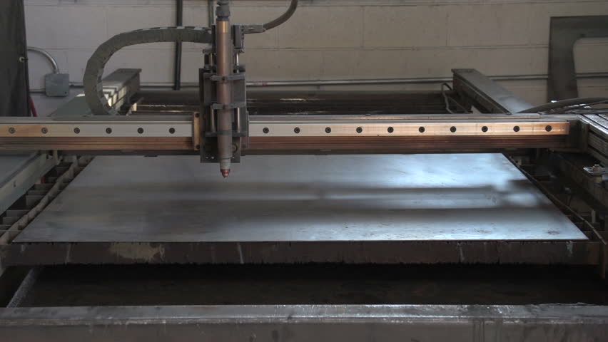 Close up of plasma cutter with sparks