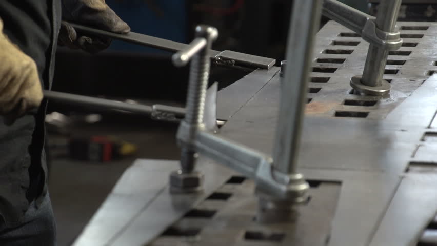 Metal welder bending sheet metal