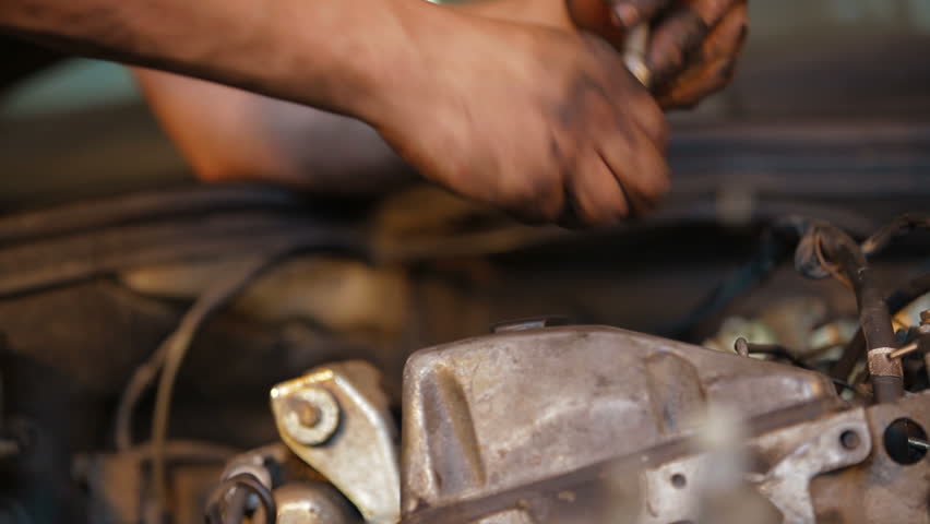 Close-up, car engine dismantling process