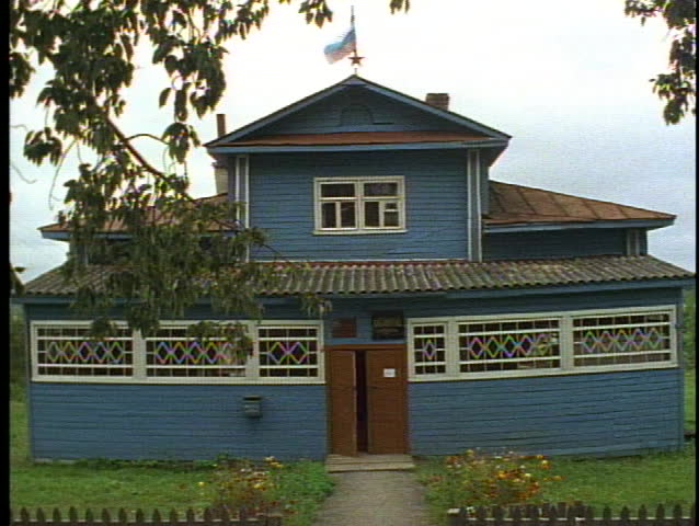 Russia, Peasant Village, blue house, tilt up