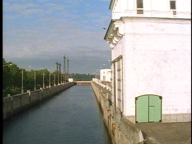 Russia, canal lock, POV top of lock tower tilt down into lock