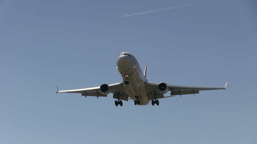 SCHIPHOL, AMSTERDAM, THE NETHERLANDS - MAY 25: Martinair Cargo plane flying overhead on May 25, 2012 in Schiphol, Amsterdam, the Netherlands.
