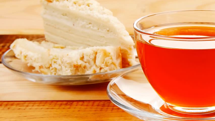 cake dessert and tea on wooden table