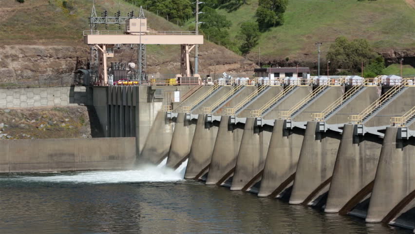 Nimbus Dam spillway Sacramento California. Hydroelectric dam on American River near Folsom. Central Valley Project a federal water project provides irrigation and municipal water to Central Valley.