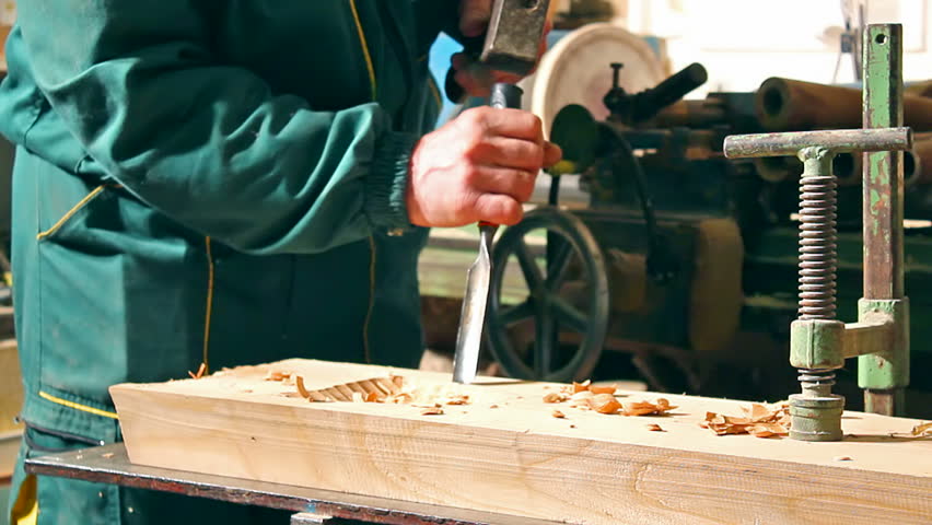 carpenter processing timber in his carpentry workshop,video clip;Carpenter 