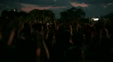 Concert Crowd, slow motion, Shot of some cheering fans at a life concert, slow motion, some visible noise due high ISO, soft focus