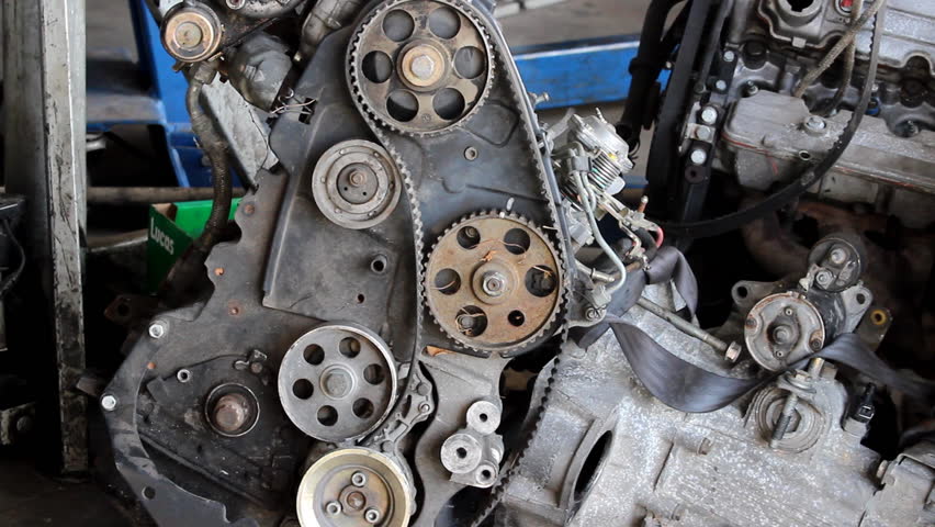Broken engines - Old car engine at the mechanics.


