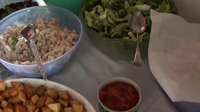 KAS, TURKEY â 15 July, 2012: English wedding party - Smorgasbord and people helping themselves