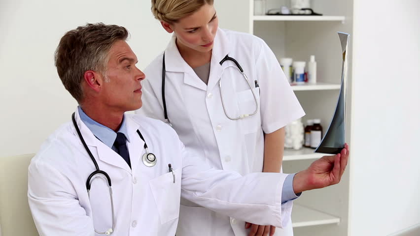 Doctors examining x-ray together