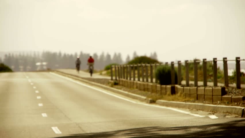 Bikes ride along road