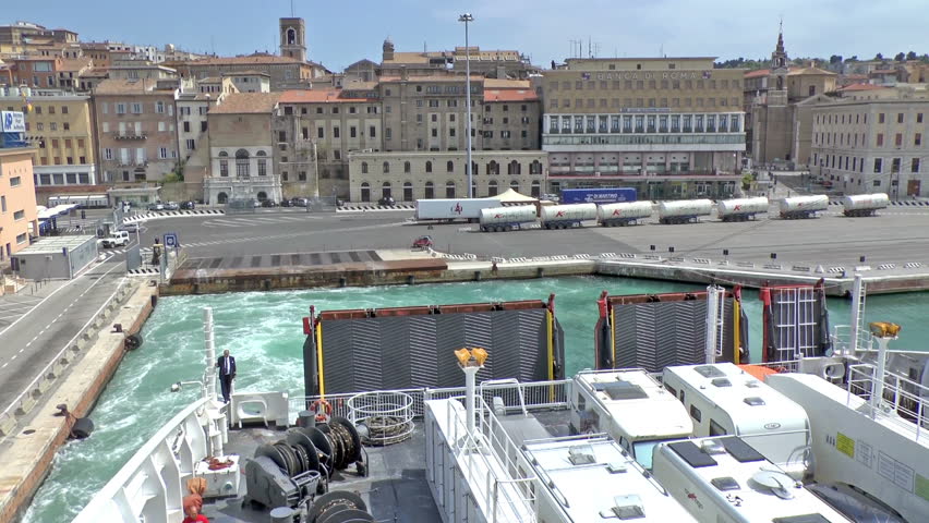 ANCONA,ITALY - APRIL 25 2013 : A Ferry leaving it's berth in the port viewed from the ferry on Aril 25 2013 in Ancona Italy