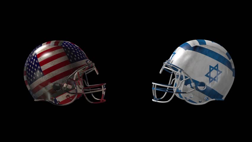 two football helmets collide