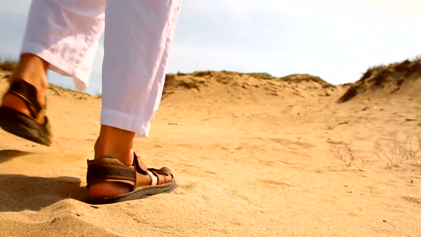 Middle Eastern Man Walking in Desert Reaching Rescue Concept HD