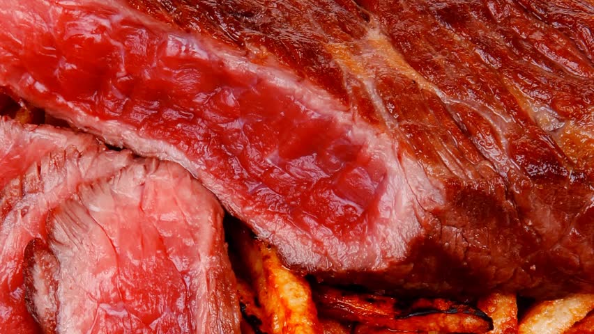 meat food : rare beef on potato chips with pepper and tomatoes over plate 1920x1080 intro motion slow hidef hd