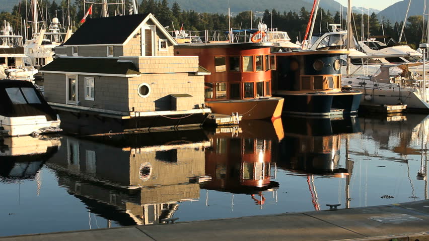Float Homes, Coal Harbor, Vancouver. Float homes in downtown Vancouver's Coal Harbor. British Columbia, Canada.
