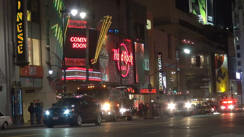 LOS ANGELES - USA, APRIL 2, 2013, Pan Fire fighter truck on Hollywood Boulevard by night