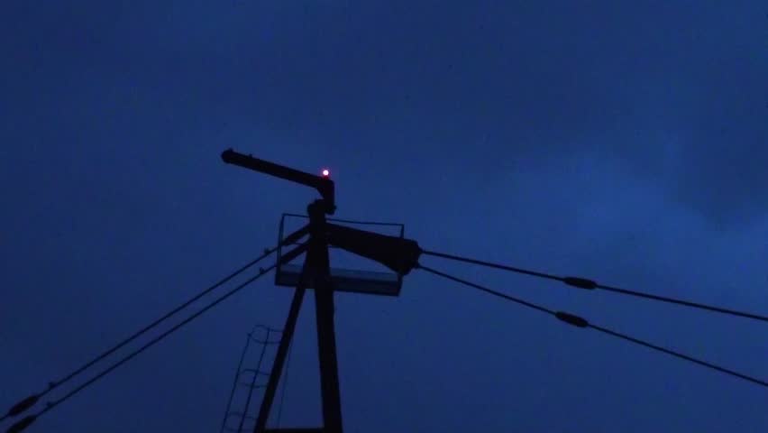 Warning light on building crane at night
