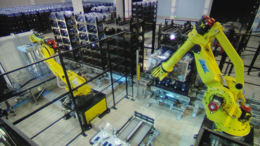 Servo-controlled robot in the bottled water factory.