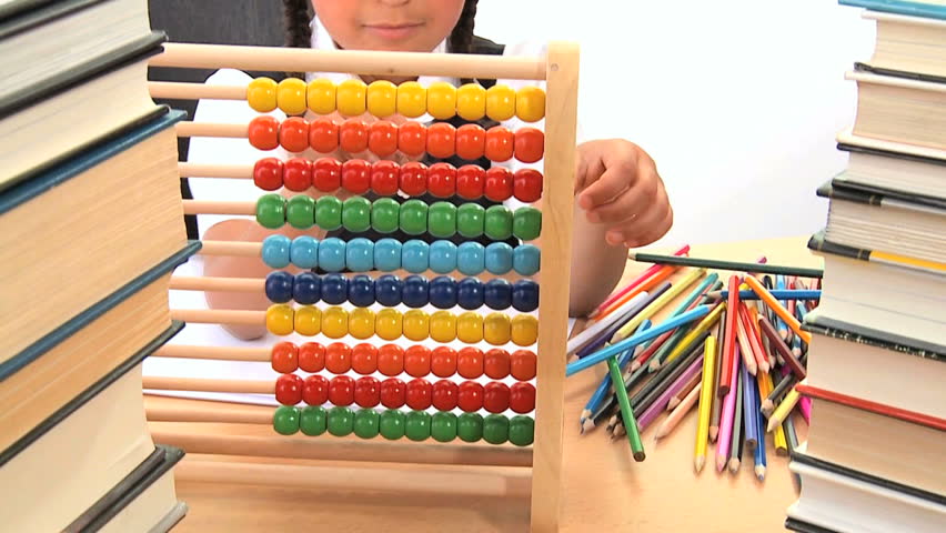 Cute african american schoolgirl early learning counting 