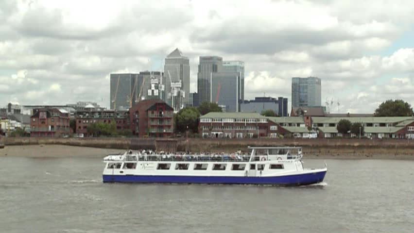 Pleasure boat trip in the Thames river close to Greenwich, London