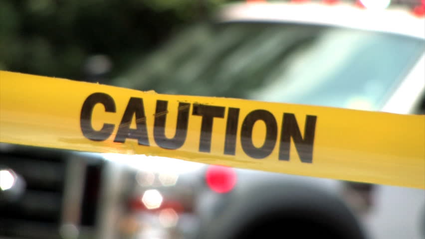 Caution tape at an accident scene.