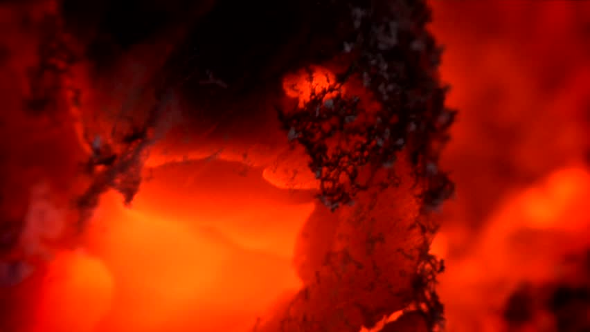 Glowing, blazing wood embers of a dying fire. Clip One