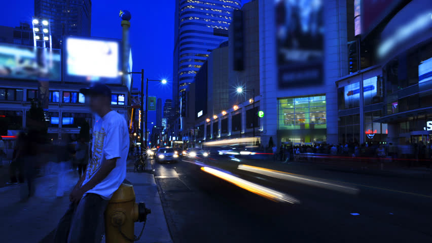 An exciting slice of city life in full HD.  Long-exposure timelapse on a panning head, covering 180 degrees. All license plates, faces and logos have been digitally obscured, frame by frame.
