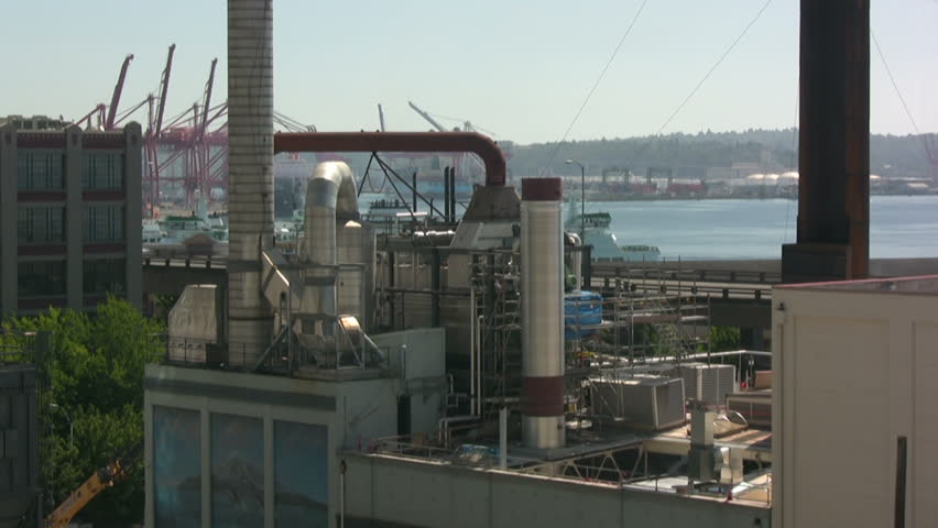 Traffic time-lapse in an industrial coastal city. HD 1080i