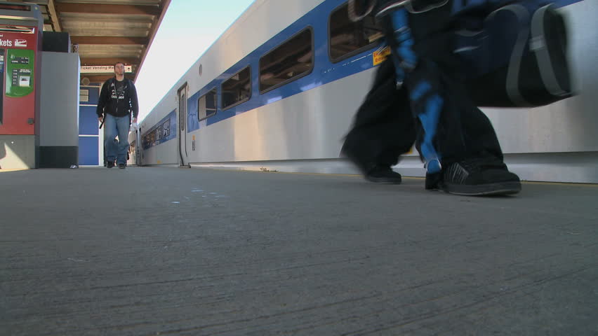 NEW YORK - NOVEMBER 7: Passengers move along a platform at the metro station on November 7, 2009 in Beacon, New York.