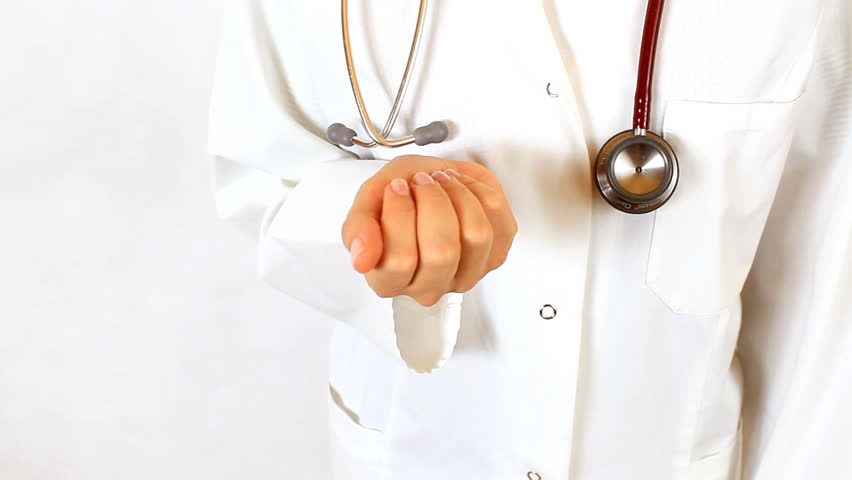 Doctor hand offering pills - 1080p